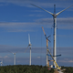 Workers install a wind turbines on September 9, 2020 in the Ardeche mountain near Lanarce, central France.